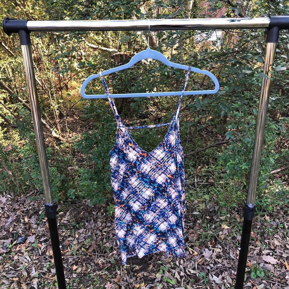 Strappy patterned tank with unique back!